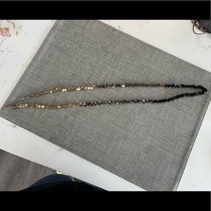 Beautiful gold, black and rose gold necklace